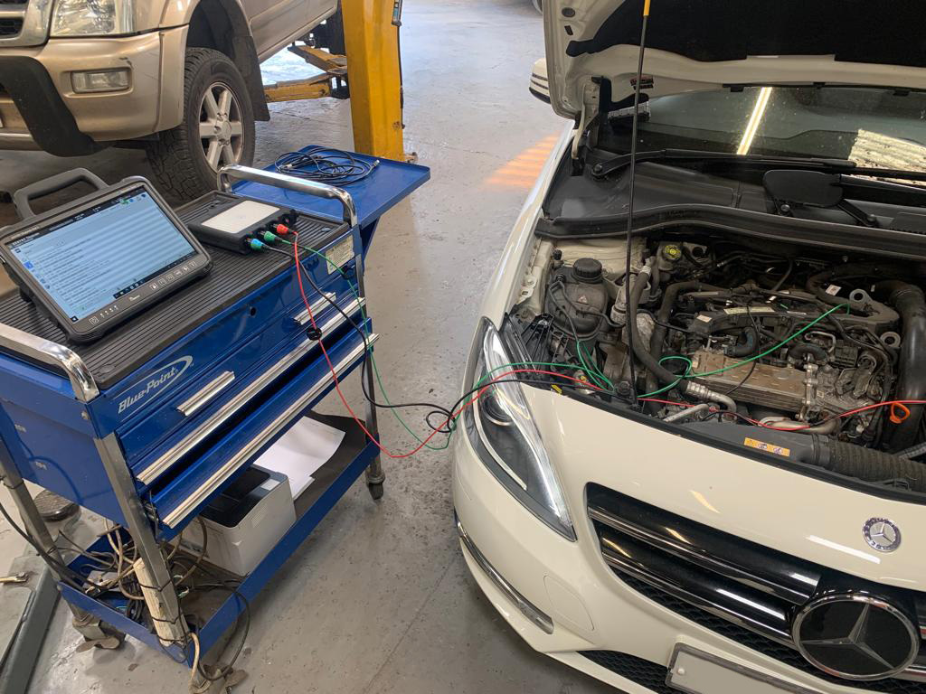 Mercedes Benz Star Diagnostics equipment on work bench