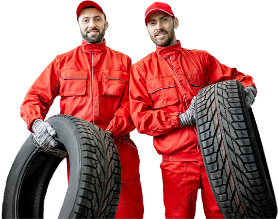 Scarlett Autos mechanics in red jumpsuits holding new tyres.