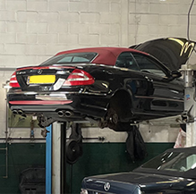 mercedes lifted up on car lift